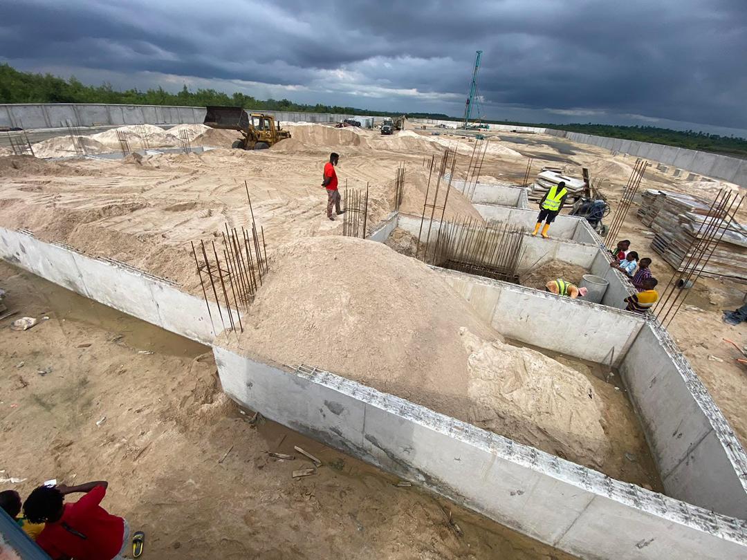 Construction crew assembling steel framing